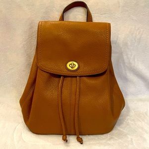 Tan/brown Coach backpack
